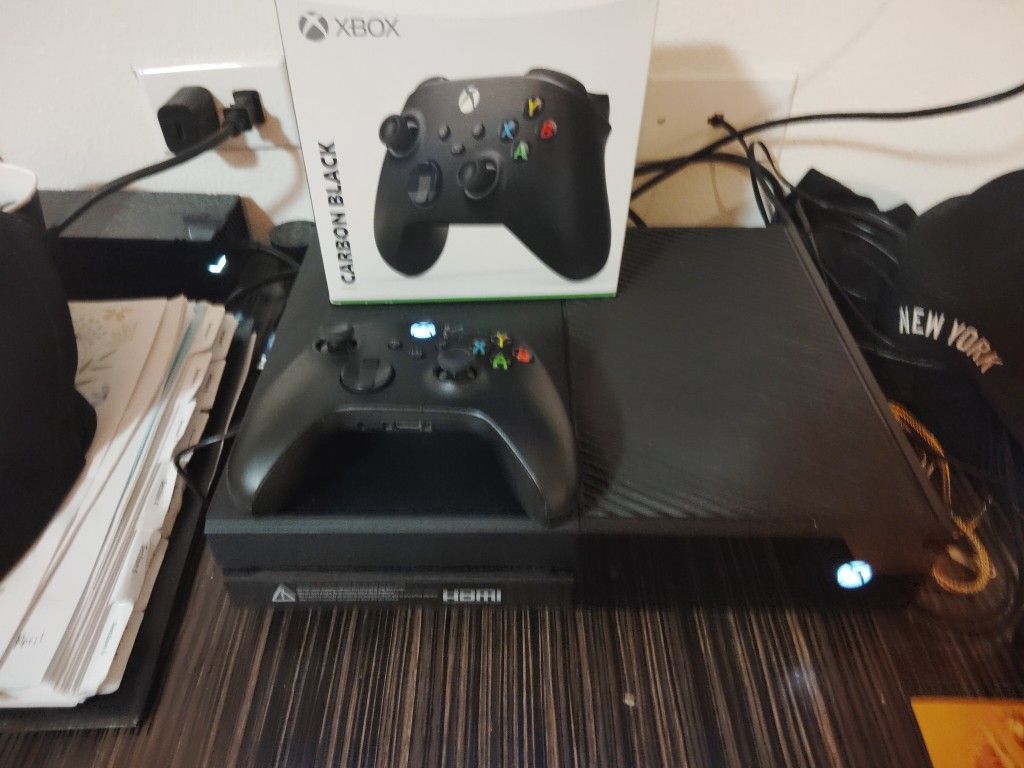 1T Xbox One With One Controller With All The Cords. Plus 50 Games On The HD