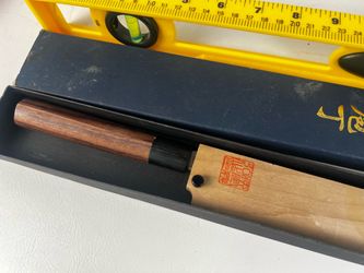 traditional Japanese yanagiba with red stamp