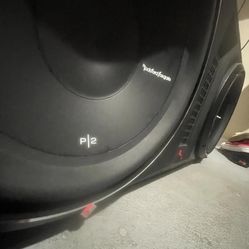 2 12” ROCKFORD FOSGATE SUBS W/ AMP