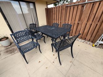 Patio table and six chairs