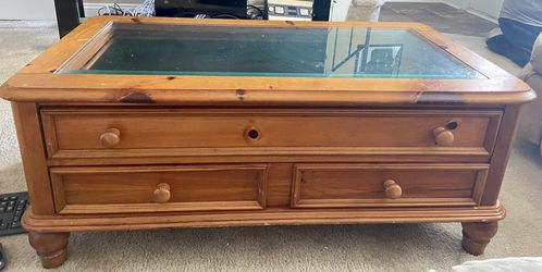 Wooden coffee table w/ glass top & 2 large drawers..Great Condition! Moving-need to sell!