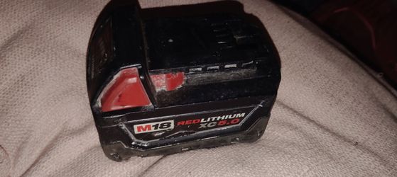 This is a Milwaukee M18 REDLITHIUM XC5.0  battery
