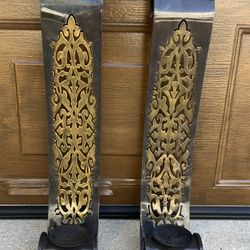Two Metal decorative pieces, for candles, to be mounted on the wall.