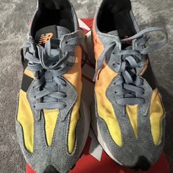 Three Pairs Of Shoes 