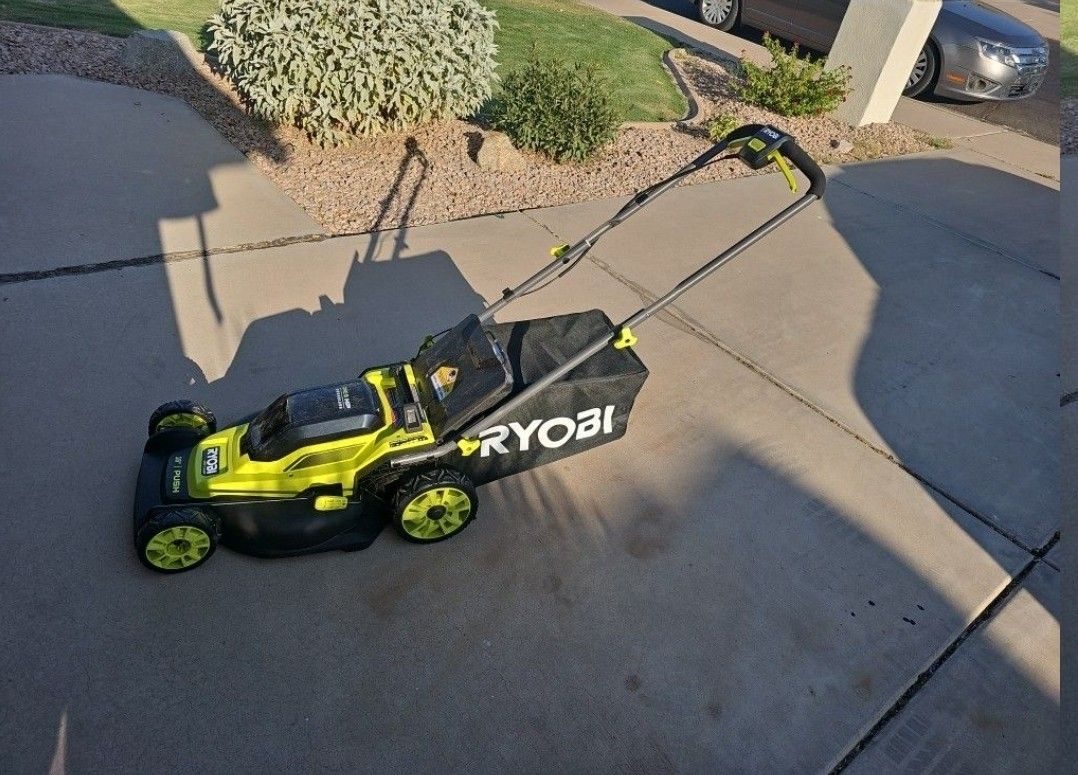 Ryobi 18v Brushless 16" Walk Behind LAWN MOWER WITH 2 3.8AH BATTERY AND CHARGER $170 CORD LESS BATTERY OPERATED WITH. CHARGER Obo