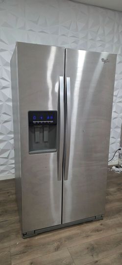 Whirlpool side by side refrigerator  freezer