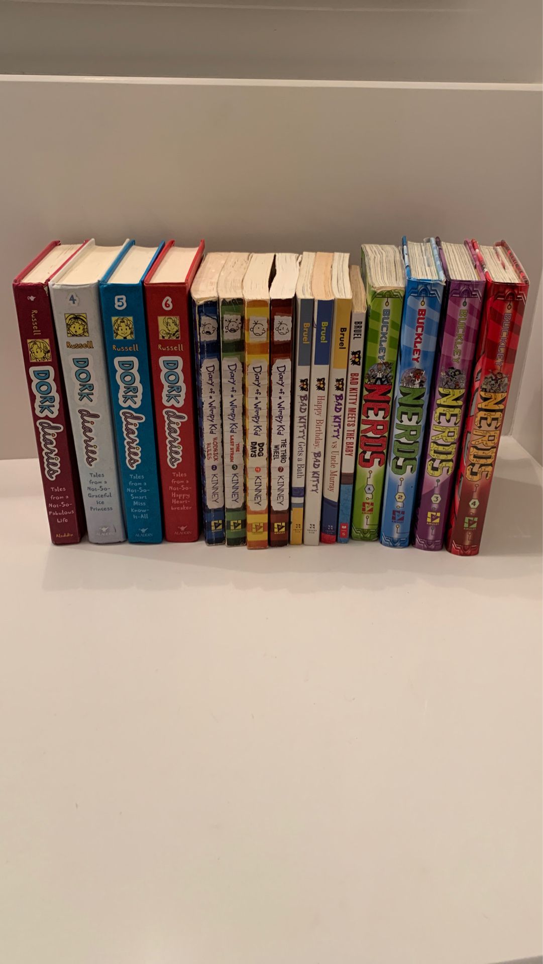 “Dork Diaries” and “Nerds” book Series “Diary of a wimpy kid” “Bad Kitty”
