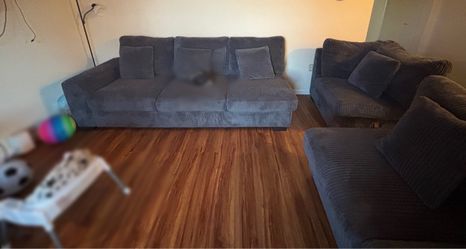 3 piece Sectional that can detach with pillows and couch vacuum included for sell