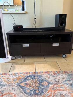 IKEA espresso colored TV stand with 2 drawers