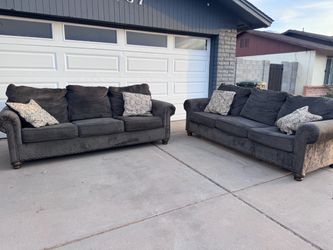 2 dark gray couches sofa sillones