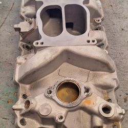 Near New Aluminum Intake  Sbc Chevrolet  55 To 94 Years Dual Pattern In Center Bolts. Excellent Used Condition.  35th Ave And McDowell Phx 