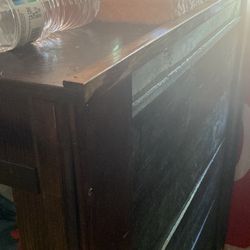 Wooden crate with metal bars