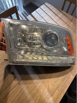 13-18 Drivers Side OEM Ram Projector Headlight