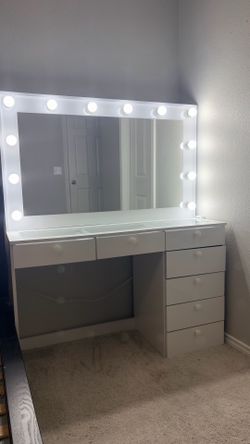 Vanity with mirror and lights