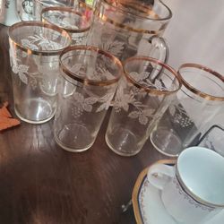 Gold rim glasses and pitcher