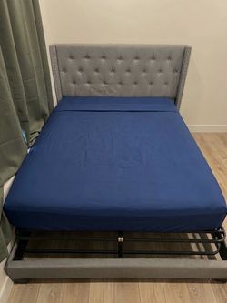 Gray Upholstered Bed Frame with Tufted Headboard
