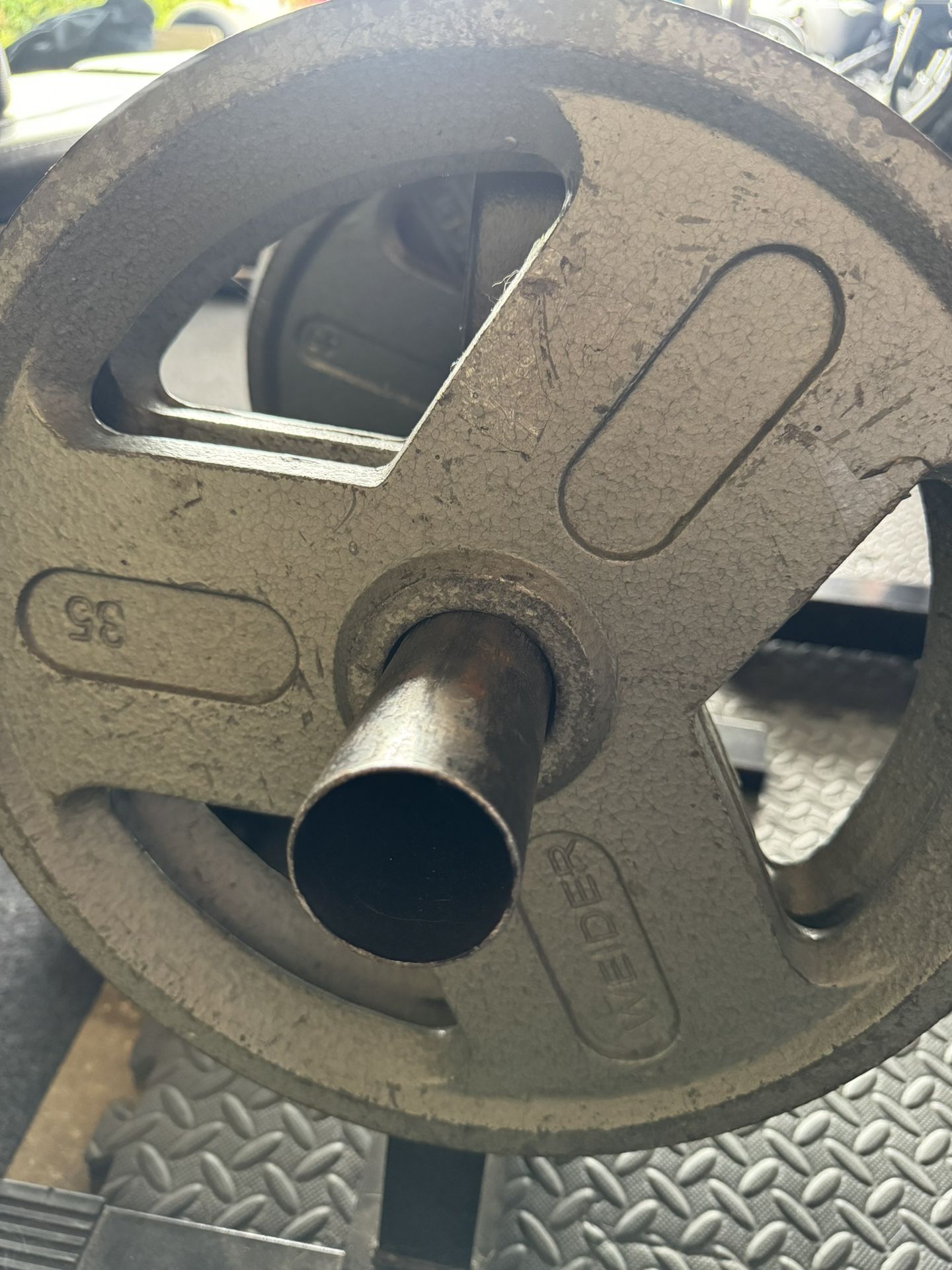 A Set Of 35 Pound Olympic Weights 