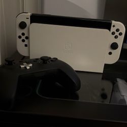Nintendo Switch Oled Model white and black