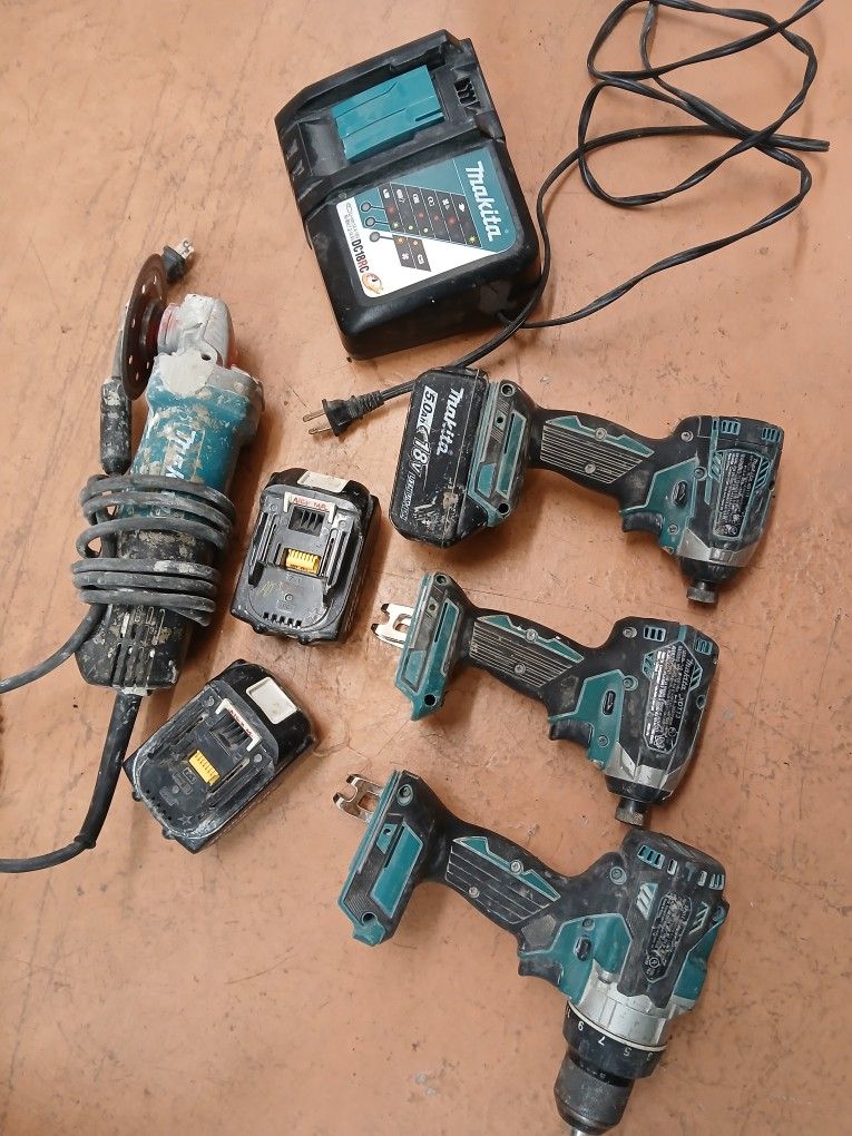 Makita hemadrill two impact drills in a makita angle grinder