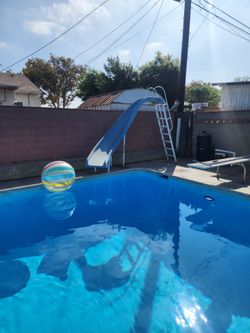 Swimming pool slide