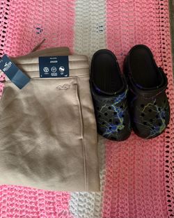 Hollister sweats and crocs.