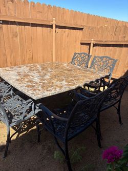 GRANITE PATIO SET W/8 CHAIRS