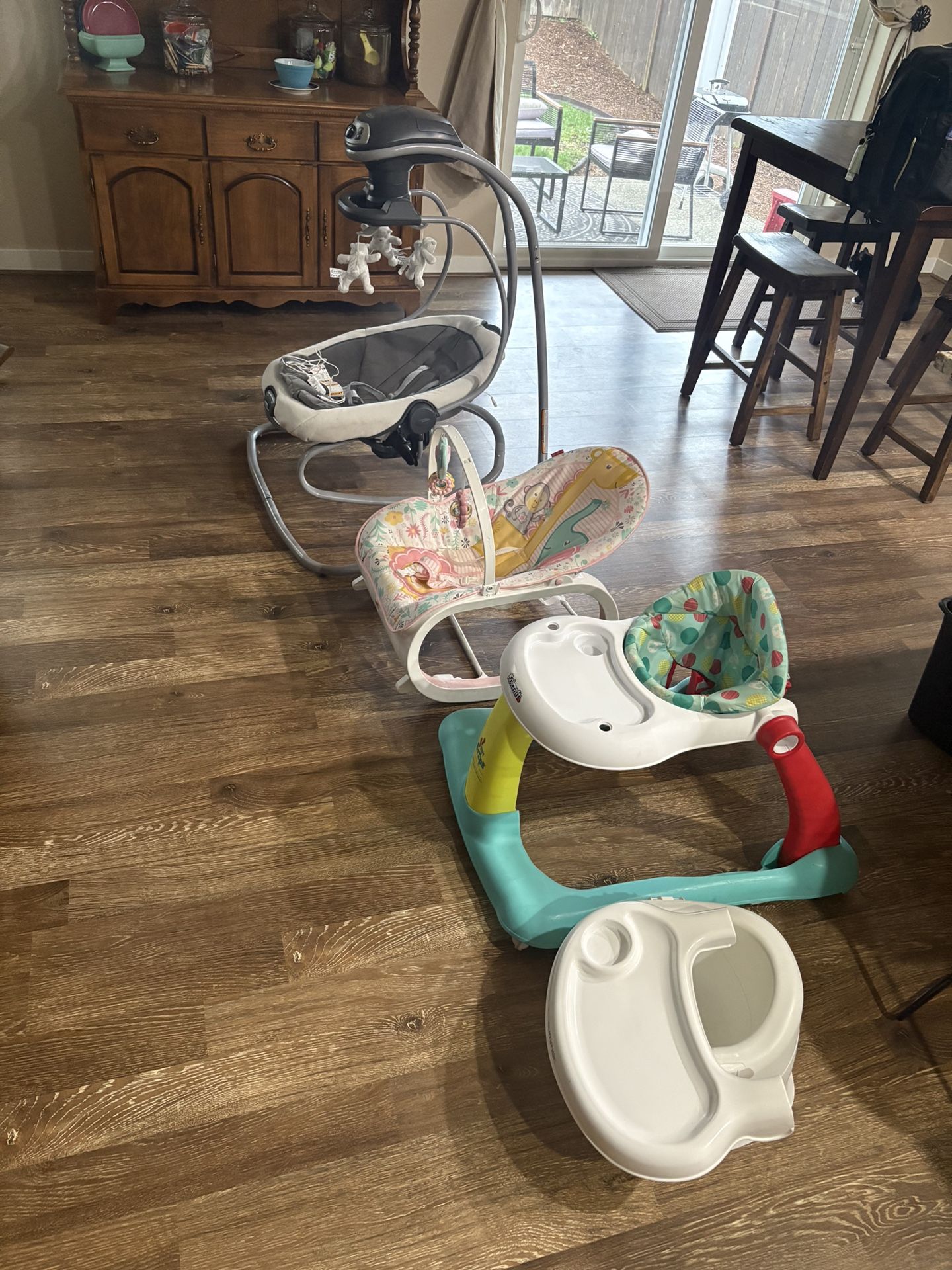 $200 Baby Swing (brand New) , Bouncer, Walker And High Chair.