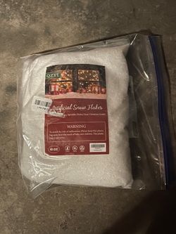10 oz bag of QZYL brand artificial snow flakes for Christmas decorations
