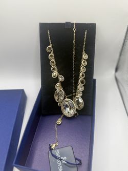 NWT AUTHENTIC Swarovski Swan Signed Delicate Enamel Long gold Crystal necklace 