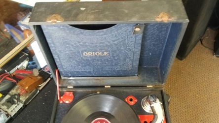 Vintage 1920s record player and records