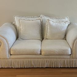 Beautiful White Loveseat Sofa With Fringe Detailing 