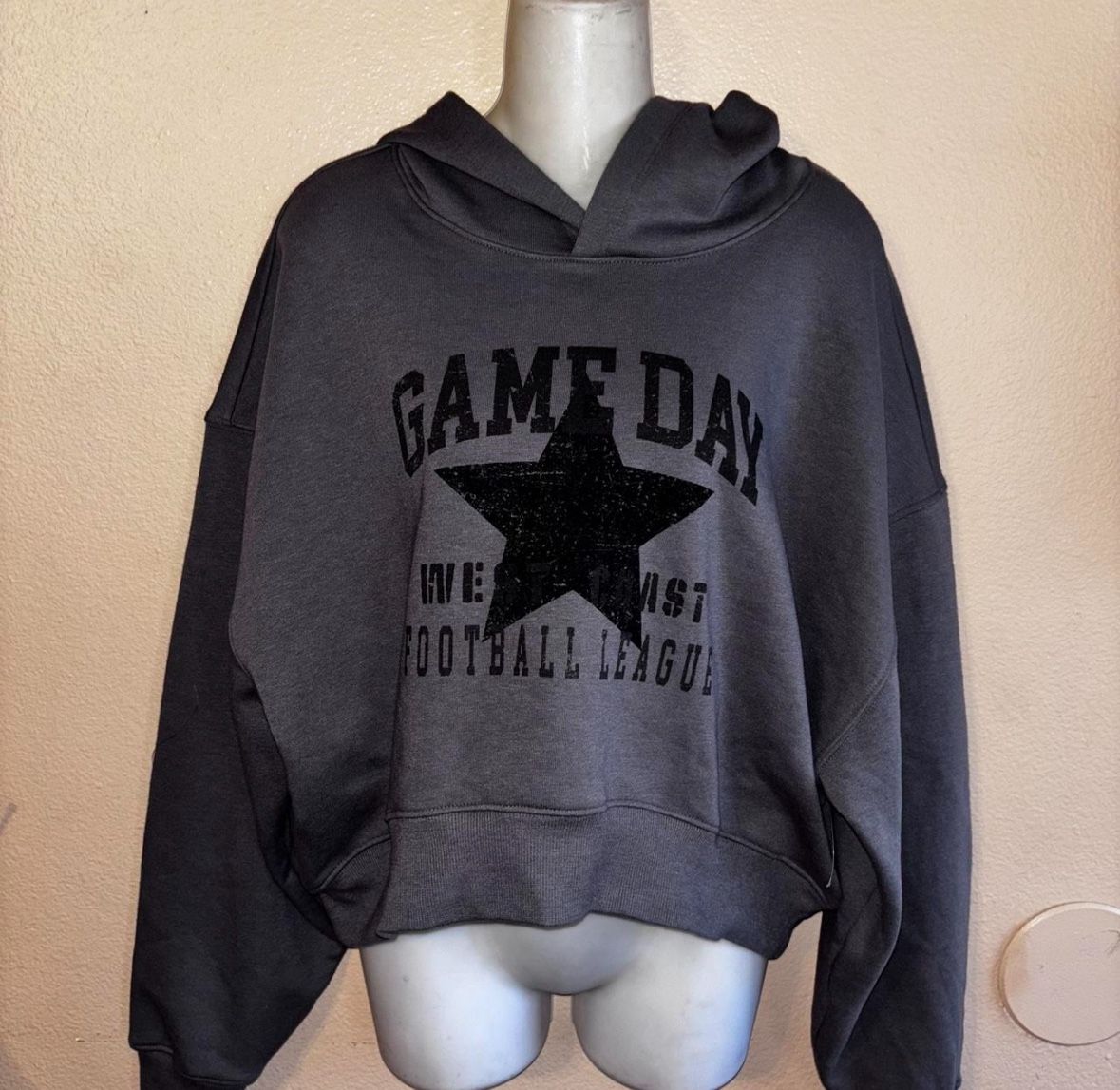 Medium Grey women’s pull over hoodie west coast football league