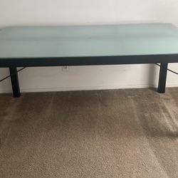 Large black wood and frosted glass table
