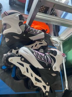 Girls roller blades (adjustable)  brand new!!!