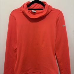 Nike Pro Dri-Fit Cowl Neck/Turtleneck athletic top in a bright neon pink/orange hue. 
