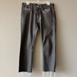 Black Coated Denim Jeans with Raw Hem