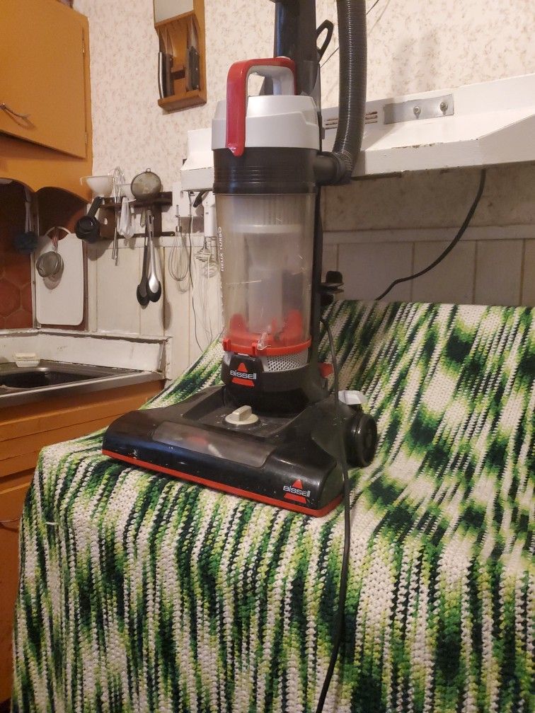 Use  Bissell Vacuum Cleaner 