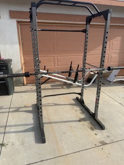 Very strong squat rack with 7 ft Olympic bar