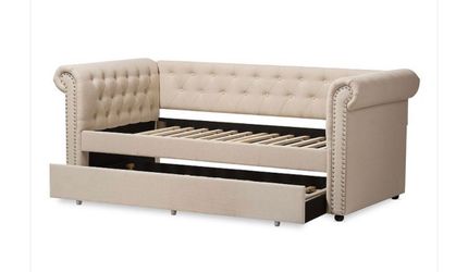 Used Sofa day bed for sale with trundle/ fits 2 twin size mattresses/$130. dollars or make an offer