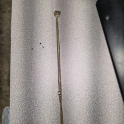 18k Goodluck charm necklace 16.7 Grms