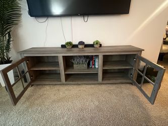 Gray TV stand w/ storage cabinets