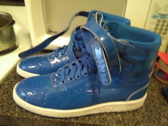 Brand new never worn puma leather hi tops size 10/1/2