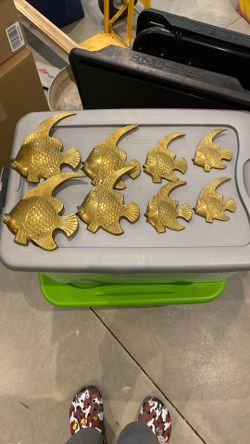 Eight solid brass fish set