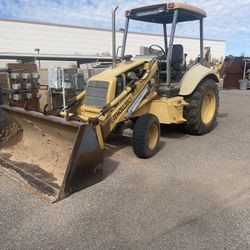New Holland 555E Backhoe