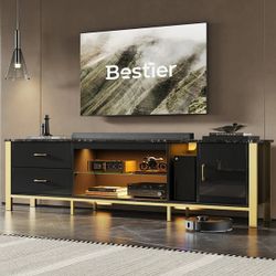 TV Stand LED Entertainment Center High Gloss Console Table for TVs up to 85" with Storage Cabinet and Drawers, Black $199   Warehouse Address: 2745 Bo