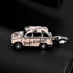 A light luxury pink floral print car pendant that can be opened, and a black dog that can be moved. A necklace suitable as a gift for taxi drivers