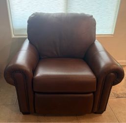 Creative Leather Chair/Recliner (battery/power cord operated)