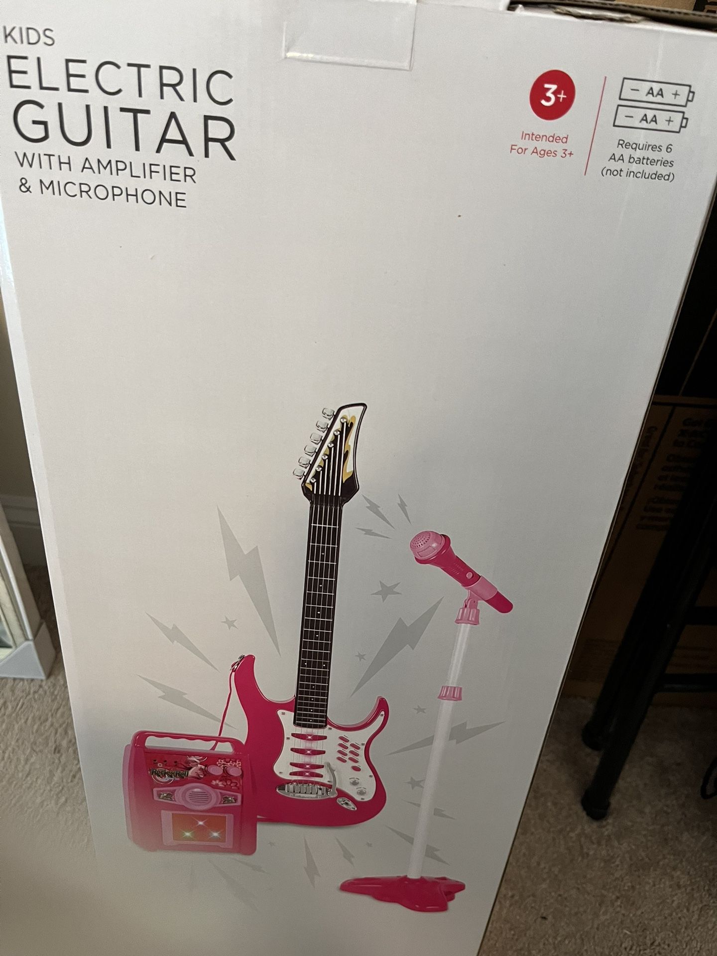 Child’s Electric Guitar and Microphone