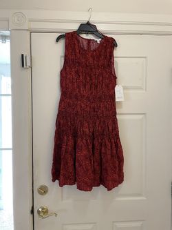 Brand new adorable women’s size large red print dress. Never worn.