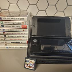 Nintendo 3DS XL with game collection